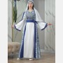 White dress with blue embroidery